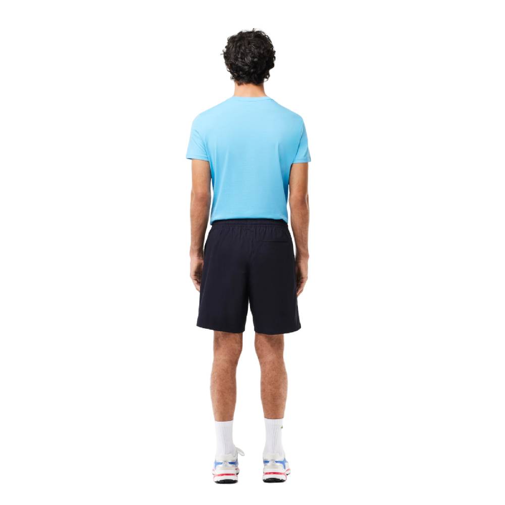 LACOSTE PANTALONI CORTI RELAXED FIT ELASTICIZZATI IN POPELINE DI COTONE GH7220HDE SKU: GH7220HDE Shopping Online