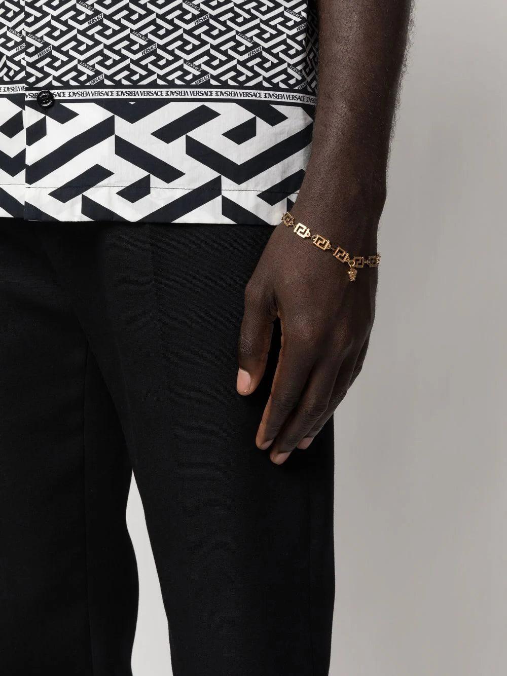 VERSACE 'greca' charm-detail bracelet Affare Del Giorno