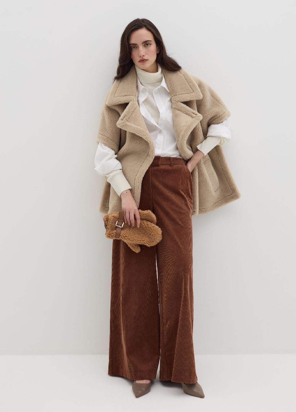 Stefanel Muffole in sherling Negozio